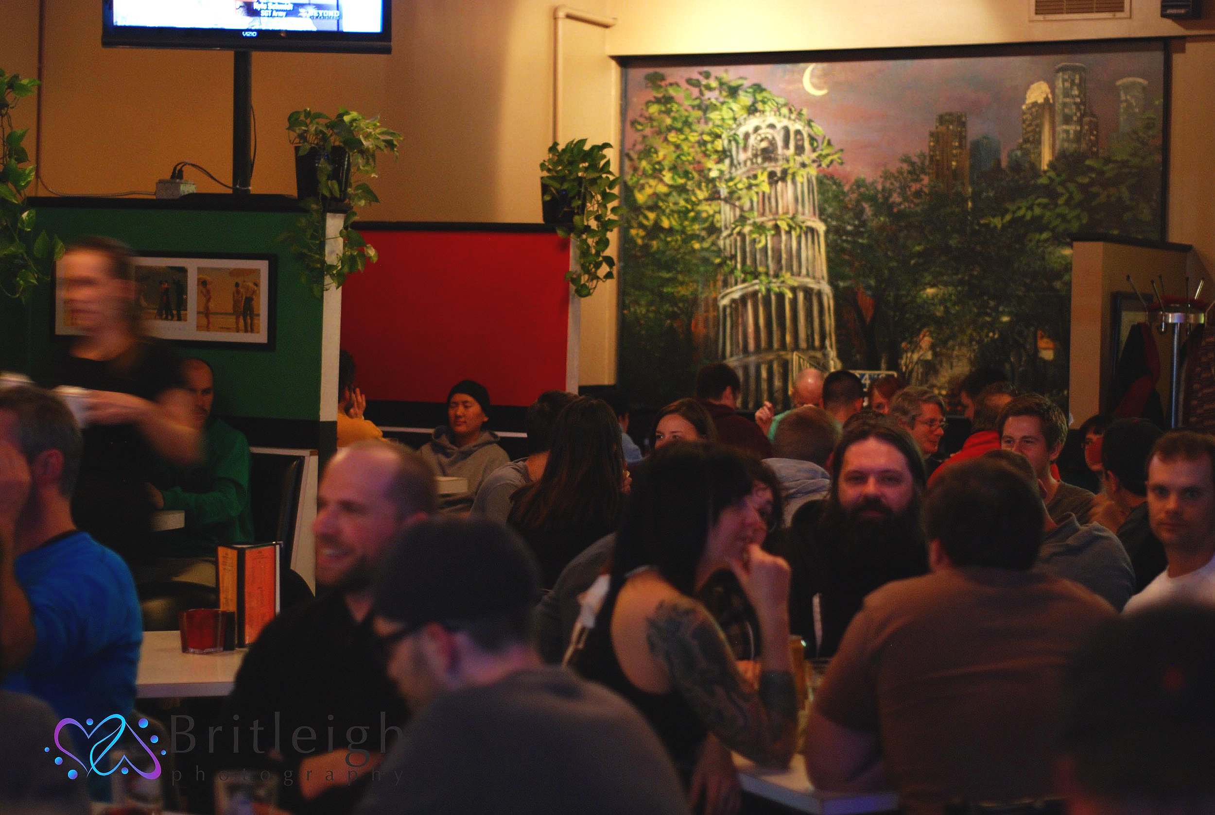 the Leaning Tower of pizza Minneapolis dining room on a crowded night